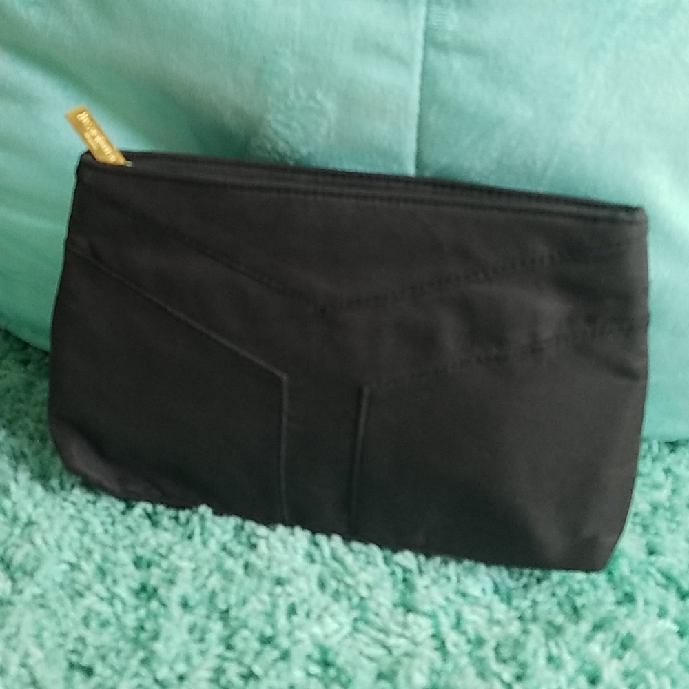 Black cloth cosmetic bag ( free with purchase)